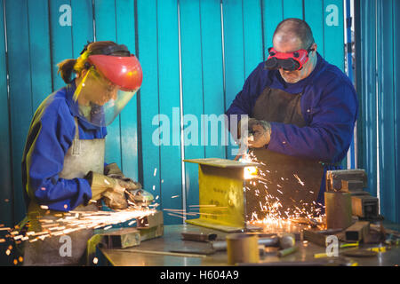 Welders working at work shop Stock Photo