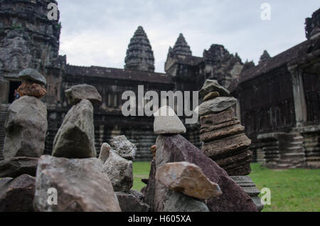 Stones are used to create a miniature replica of the towers of Angkor Wat Stock Photo