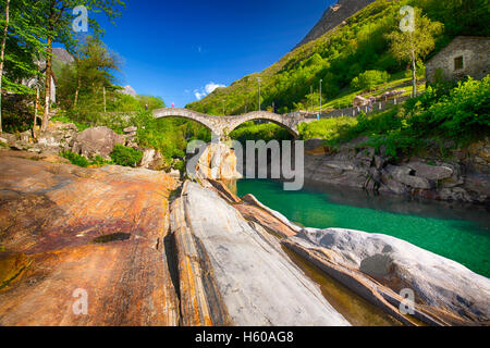 Double arch stone bridge at Ponte dei Salti with waterfall, Lavertezzo, Verzascatal, Ticino,Switzerland Stock Photo