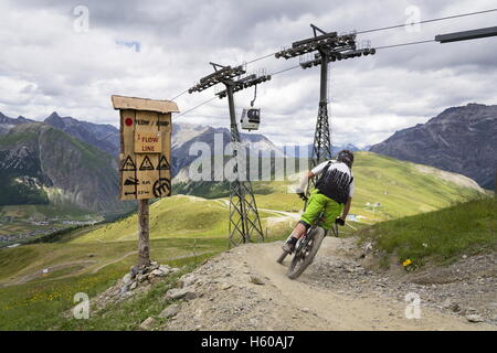 Flow line in bikepark in mountains above Livigno, Italy Stock Photo