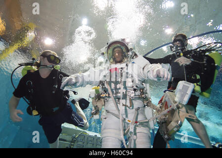 NASA International Space Station Expedition 50/51 Soyuz MS-03 crew member French astronaut Thomas Pesquet of the European Space Agency walks underwater in a spacesuit for ISS EVA spacewalk maintenance training at the Sonny Carter Training Facility Neutral Buoyancy Laboratory January 12, 2016 in Houston, Texas. Stock Photo