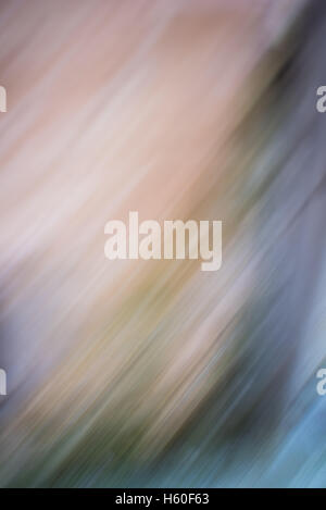 Abstract yellow, orange, blue and green blurry diagonal lines Stock Photo