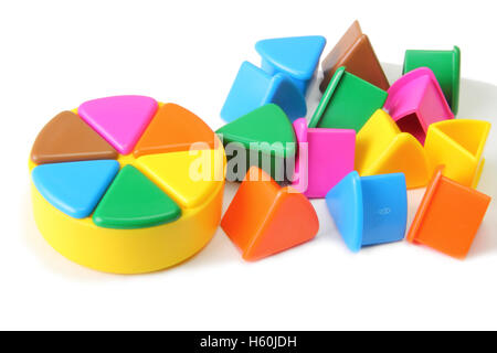 Trivial Pursuit playing pieces on a white background Stock Photo