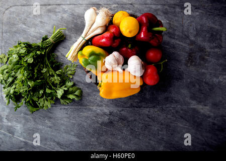 fresh vegetables on  black marble view from above in a modern style Stock Photo