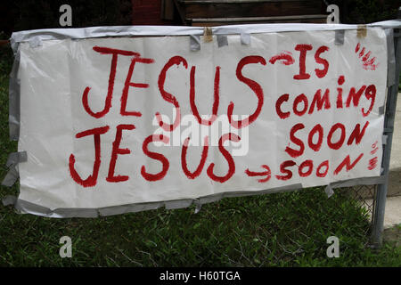 Sign, 'Jesus is Coming Soon', urban neighborhood of Detroit, Michigan USA Stock Photo