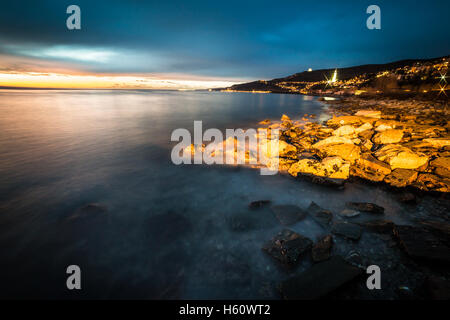 evening on the shoreline of Trieste Stock Photo