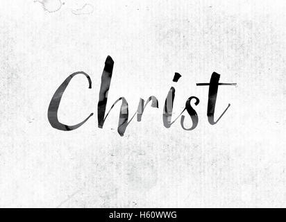 The word 'Christ' concept and theme painted in watercolor ink on a white paper. Stock Photo