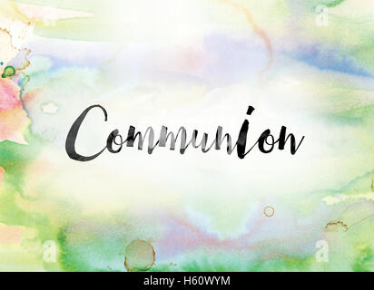 The word 'Communion' painted in black ink over a colorful watercolor washed background concept and theme. Stock Photo