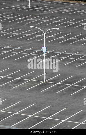 vacant car parking lot with white mark and light pole Stock Photo