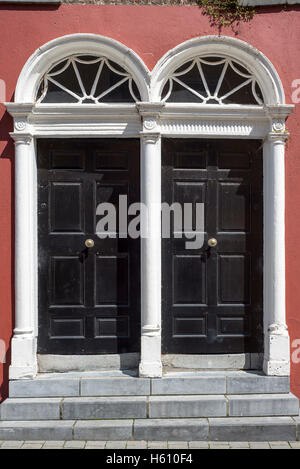 two arched georgian doors in kilkenny city ireland Stock Photo