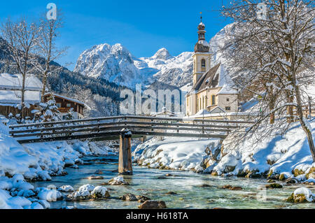 Classic view of famous Church of Ramsau in winter, Berchtesgadener Land, Bavaria, Germany Stock Photo