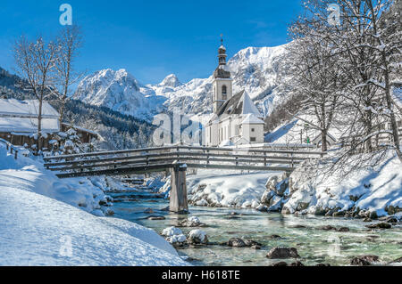 Classic view of famous Church of Ramsau in winter, Berchtesgadener Land, Bavaria, Germany Stock Photo