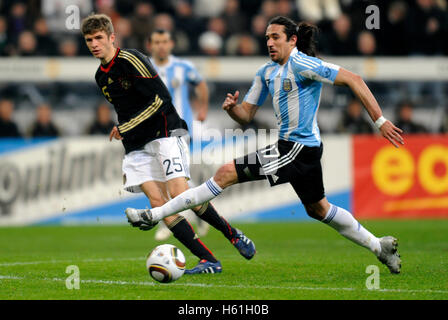 Thomas Mueller, Jonas Gutierrez, football match Germany vs. Argentina 0:1 in the Allianz-Arena, Munich, Bavaria Stock Photo