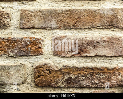 Bucharest, Romania, 9 February 2016: Detailed old red brick wall background photo texture. Stock Photo