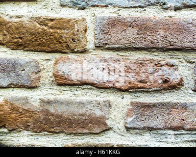 Bucharest, Romania, 9 February 2016: Detailed old red brick wall background photo texture. Stock Photo