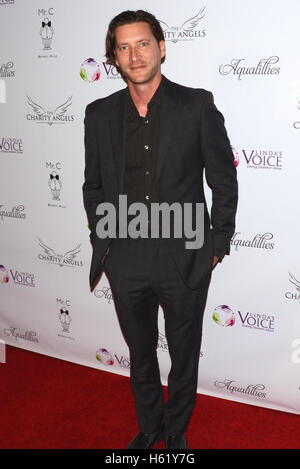 Mike Falkow attends BBQ And Bikinis Benefit hosted by Linda's Voice Foundation Honoring Beverly Johnson at Mr. C Stock Photo