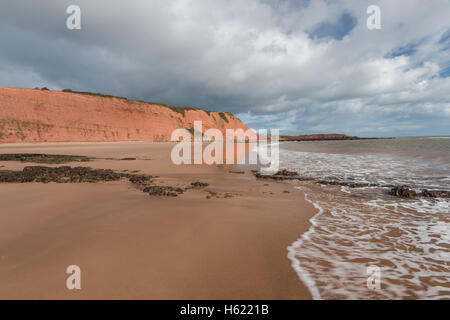sandy beach with red sand in Exmouth ,Devon, UK. Jurassic coast, british heritage site. Stock Photo