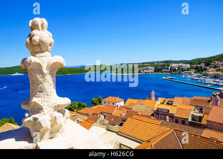 Rooftop view of the old town of Korcula, with roofs, houses and boats, in Dalmatia, Croatia Stock Photo