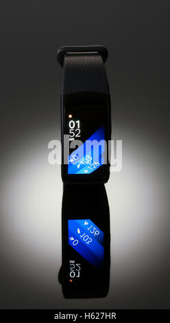 Fitness watch on dark background studio shot Stock Photo