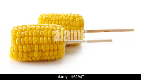 Grilled sweet corn on the cob, isolated on white background Stock Photo