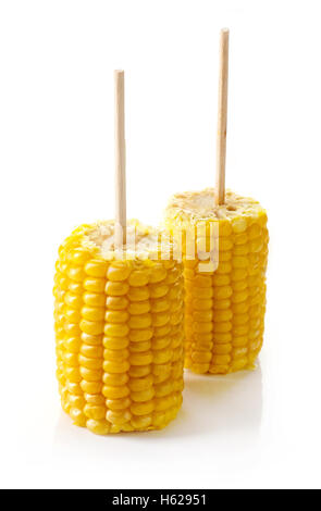Grilled sweet corn on the cob, isolated on white background Stock Photo