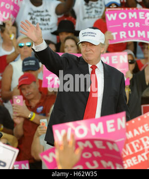 Naples, Florida, USA. 23rd Oct, 2016.  - Republican presidential nominee Donald Trump waves to his supporters after speaking at a campaign rally at the Collier County Fairgrounds in Naples, Florida on October 23, 2016. With just 16 days until the November election, Trump begins a two-day, five-city campaign swing through Florida with additional stops in St. Augustine, Tampa, Sanford, and Tallahassee. Credit:  Paul Hennessy/Alamy Live News Stock Photo