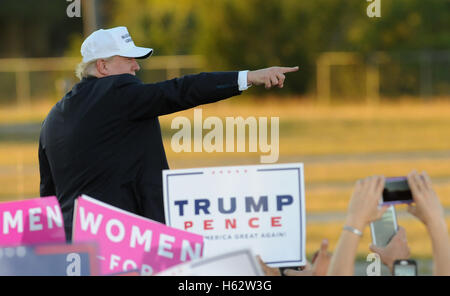 Naples, Florida, USA. 23rd Oct, 2016.  - Republican presidential nominee Donald Trump gestures at a campaign rally at the Collier County Fairgrounds in Naples, Florida on October 23, 2016. With just 16 days until the November election, Trump begins a two-day, five-city campaign swing through Florida with additional stops in St. Augustine, Tampa, Sanford, and Tallahassee. Credit:  Paul Hennessy/Alamy Live News Stock Photo