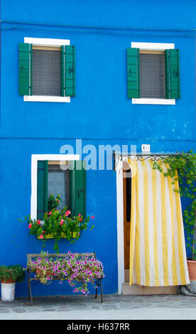 Colourful fishermen's cottages on Burano island in the Venice lagoon, Italy Stock Photo