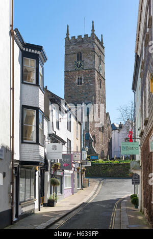 Looking up Anzac Street in Dartmouth, Devon UK towards the church of St. Saviour Stock Photo