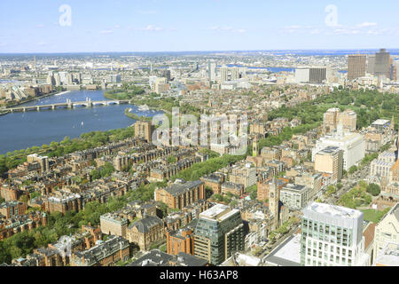 Aerial view of Boston City Skyline in the Boston Harbor where the famous tea party ocurred.  The Boston Tea Party arose from two Stock Photo