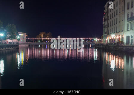 Reflections in the Rhone river in Geneva at night - 1 Stock Photo