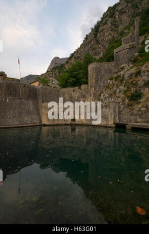 Gurdic tower medieval fortress walls with mountains in the background ...