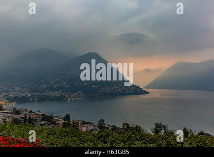 Sunrise on the lake of Lugano in autumn Stock Photo