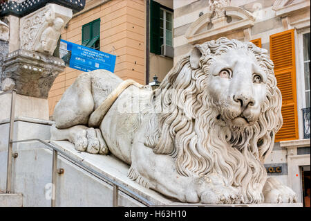 The white sculpture of lion located near the entrance of Cattedrale di San Lorenzo. Stock Photo