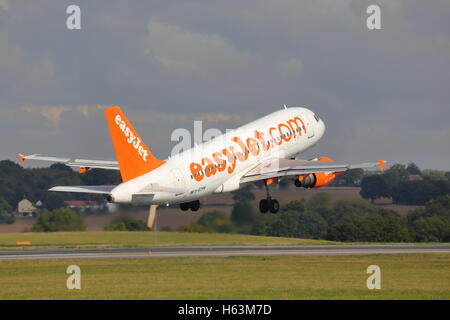 Low-cost airline Easyjet Airbus A319 G-EZAM taking off from London Luton Airport, UK Stock Photo