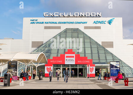 Main entrance with people walking on front of it of the ExCeL Centre, an exhibitions center situated in East London Stock Photo