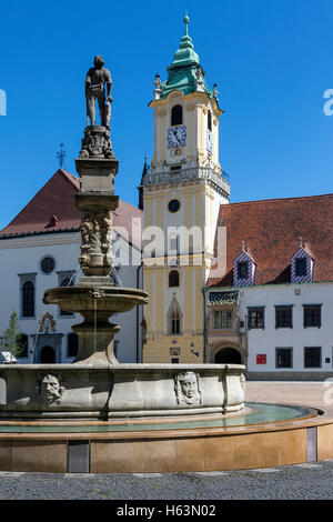 Fountains and the Old Town Hall buildings in the 'old town' district of Bratislava, the capital city of Slovakia. Stock Photo