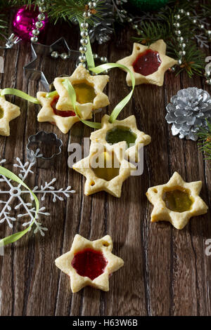 Stained cookies homemade star-shaped cookies with caramel. Gift for Christmas or New Year. Stock Photo