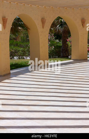 open roof veranda with arches and shadows Stock Photo
