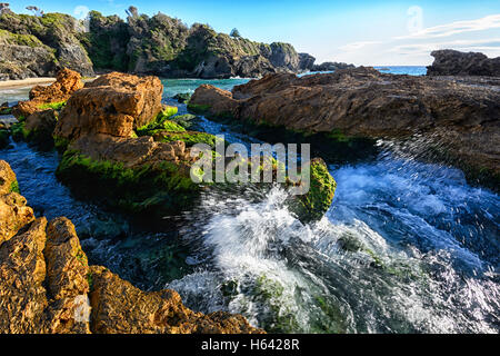 View of Pillow lava. This rock shape is most often the result of undersea volcano eruptions.Narooma Surf Beach, New South Wales, NSW, Australia Stock Photo