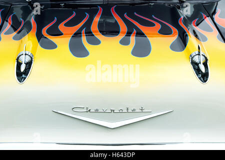 1957 Chevrolet, Bel Air. Chevy hood rockets on bonnet with flames. Classic American car Stock Photo