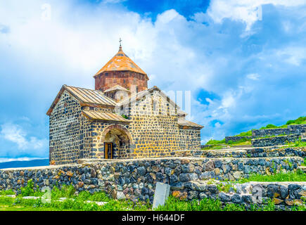 The St Astvatsatsin Church of Sevanavank Monastery, neighbors with the medieval cemetery on Sevan Peninsula, Armenia. Stock Photo