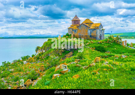 The Sevan Lake boasts many monasic complexes on its banks, the Hayravank Monastery is one of them, Armenia. Stock Photo