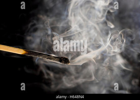 Smoking match Stock Photo