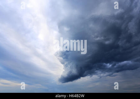 big dark storm cloud in the sky photographed in close-up Stock Photo