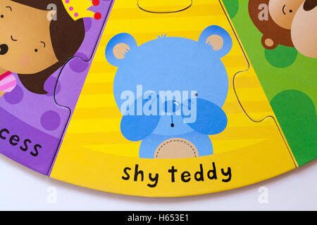 shy teddy, part of ELC Funny Faces puzzle made from forest friendly cardboard Stock Photo