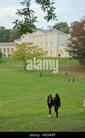 People enjoying Autumn day at Kenwood House in Hampstead Heath. London.UK Stock Photo