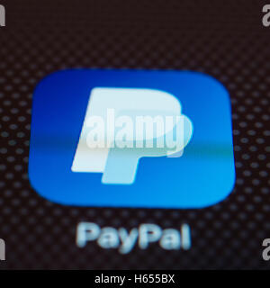 Paypal online banking app close up on iPhone smart phone screen Stock Photo