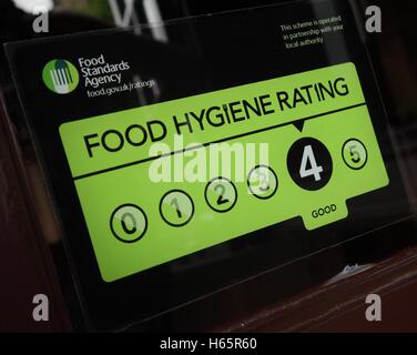 Food Standards Agency - food hygiene rating sign outside a shop, number four of five, 4 of 5 Stock Photo