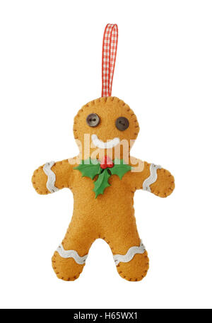 Handmade felt gingerbread man with red ribbon for Christmas Stock Photo